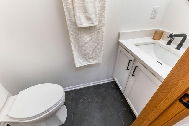 6641 Steen St, Canal Winchester, OH 43110 - half bathroom featuring vanity and tile patterned flooring