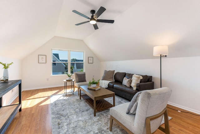 6641 Steen St, Canal Winchester, OH 43110 - living area featuring wood finished floors, ceiling fan, and lofted ceiling