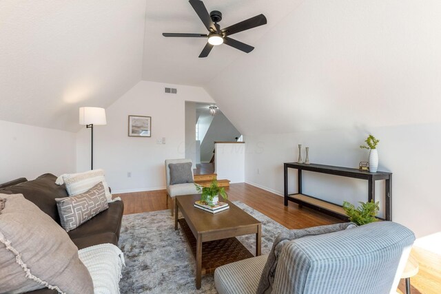6641 Steen St, Canal Winchester, OH 43110 - living area with wood finished floors, vaulted ceiling, and ceiling fan
