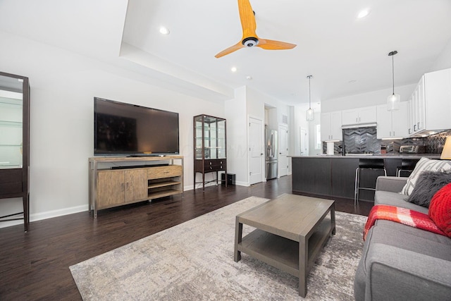 199 E 5th Ave, Columbus, OH 43201 - living area with dark wood-style flooring, a ceiling fan, baseboards, and recessed lighting
