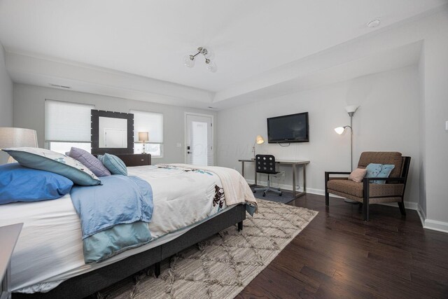 199 E 5th Ave, Columbus, OH 43201 - bedroom featuring dark wood finished floors and baseboards