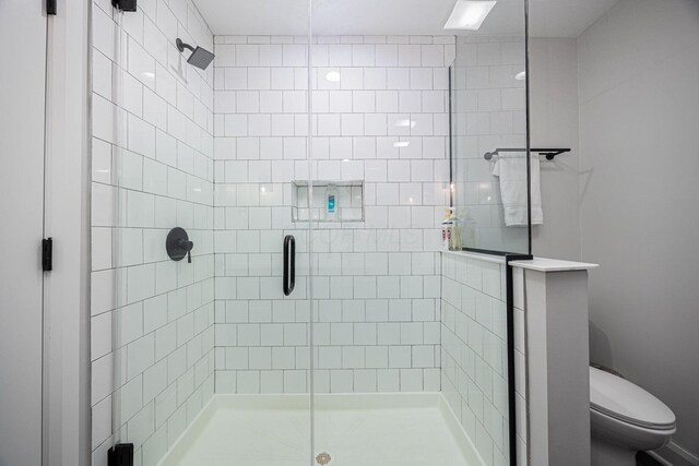 199 E 5th Ave, Columbus, OH 43201 - full bathroom featuring a stall shower and toilet
