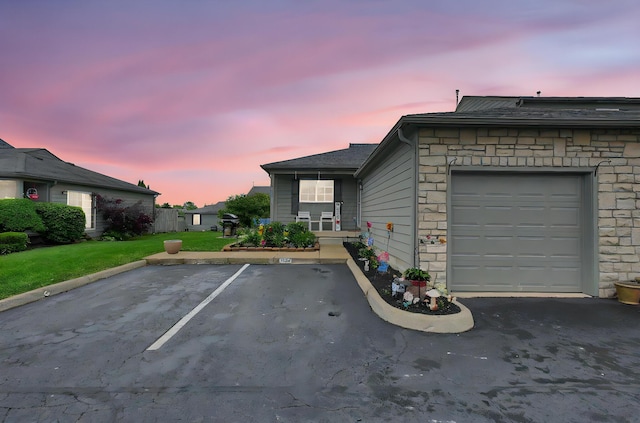4057 Blendon Point Dr Unit 60A, Columbus, OH 43230 - view of front of home with stone siding and uncovered parking