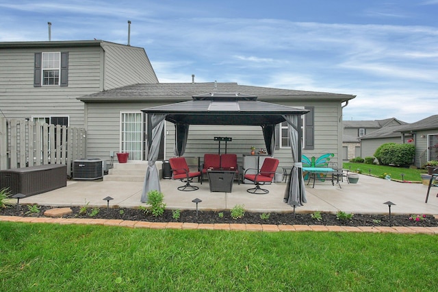 4057 Blendon Point Dr Unit 60A, Columbus, OH 43230 - rear view of property featuring a gazebo, a patio area, cooling unit, and a lawn