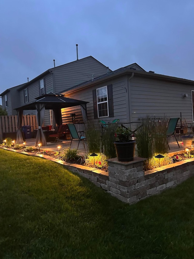 4057 Blendon Point Dr Unit 60A, Columbus, OH 43230 - back of house with a fire pit, a gazebo, a yard, and a patio area
