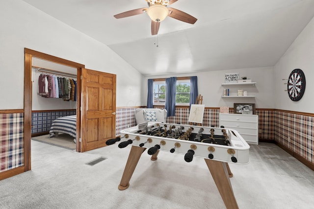 11007 Hebron Rd, Buckeye Lake, OH 43008 - rec room featuring a wainscoted wall, carpet, vaulted ceiling, and a ceiling fan