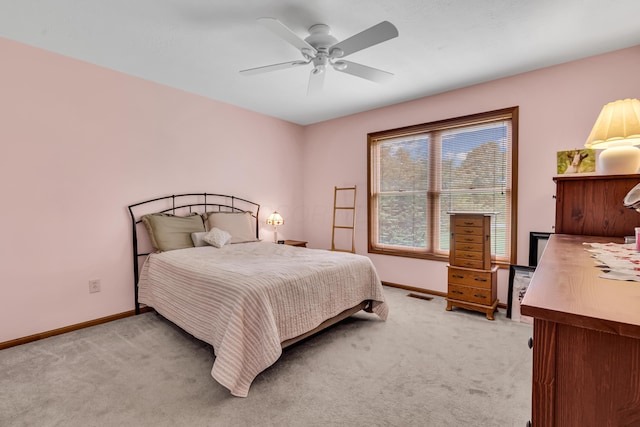 3753 Homer Rd NW, Utica, OH 43080 - bedroom featuring light carpet, baseboards, and a ceiling fan