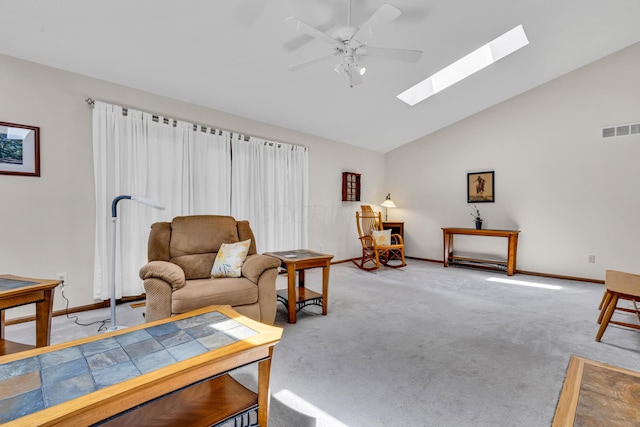 3753 Homer Rd NW, Utica, OH 43080 - living room with a ceiling fan, a skylight, baseboards, light colored carpet, and high vaulted ceiling