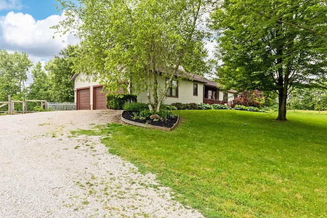 3753 Homer Rd NW, Utica, OH 43080 - view of front of house featuring gravel driveway and a garage