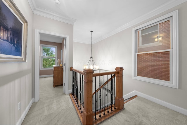 1054 Perry St, Columbus, OH 43201 - hall with an upstairs landing, carpet, baseboards, and ornamental molding