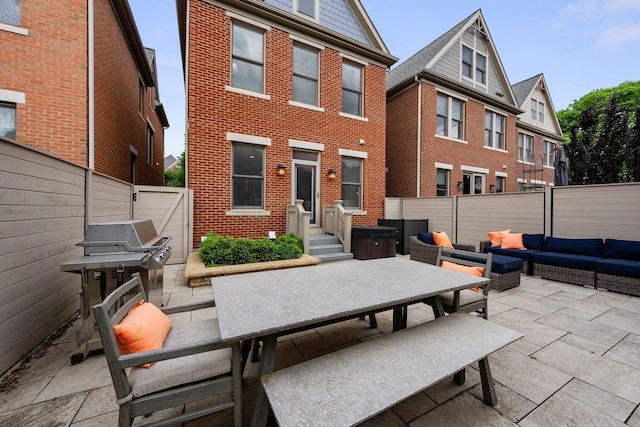 1054 Perry St, Columbus, OH 43201 - fenced backyard featuring an outdoor hangout area, a patio, and outdoor dining area