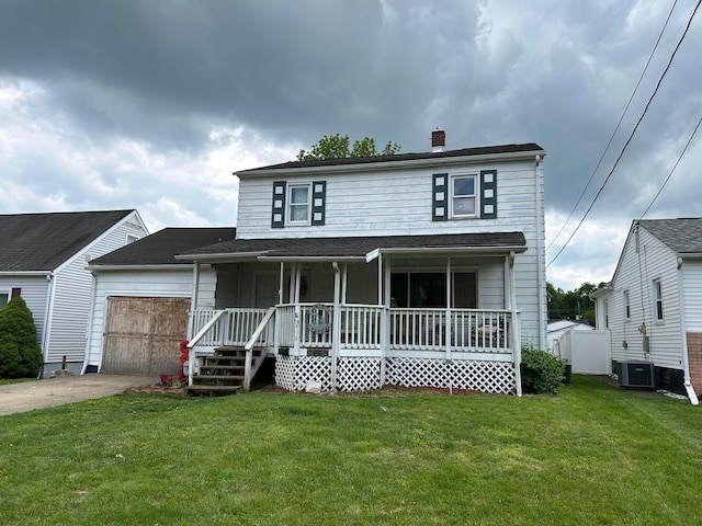 416 Reese Ave, Lancaster, OH 43130 - view of front of property with a porch, a garage, a front yard, a chimney, and driveway