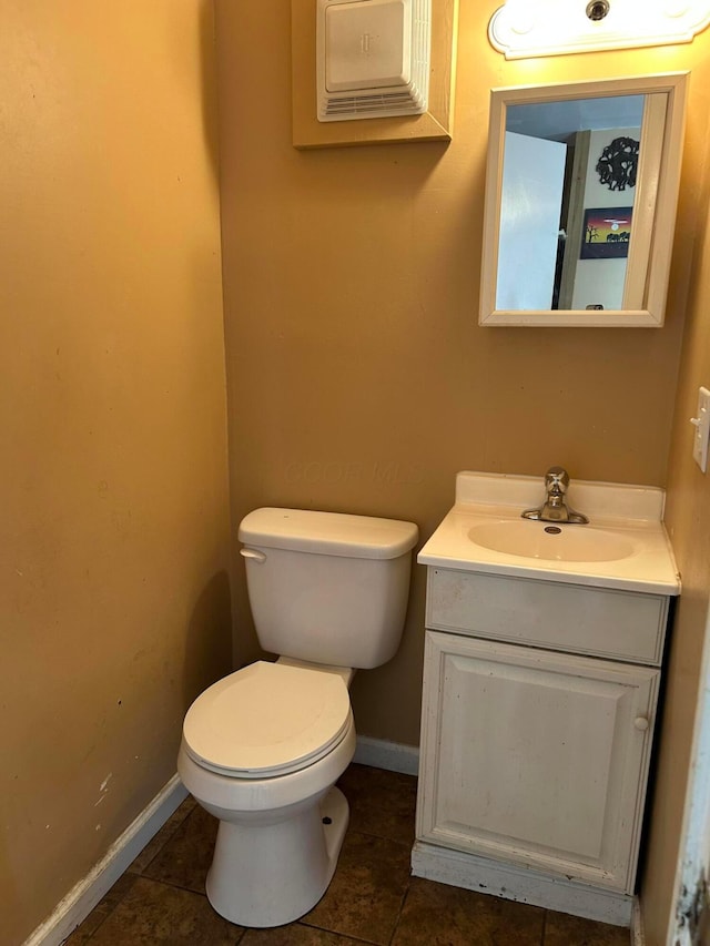 416 Reese Ave, Lancaster, OH 43130 - half bath featuring toilet, vanity, baseboards, and tile patterned flooring