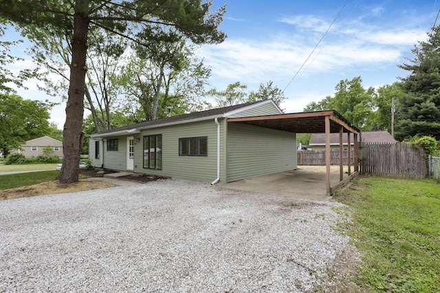 366 Orchard Ln, Sunbury, OH 43074 - view of front of house featuring gravel driveway and a carport