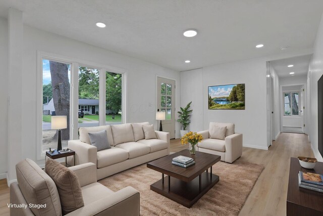 366 Orchard Ln, Sunbury, OH 43074 - living area featuring light wood-style flooring, healthy amount of natural light, recessed lighting, and baseboards