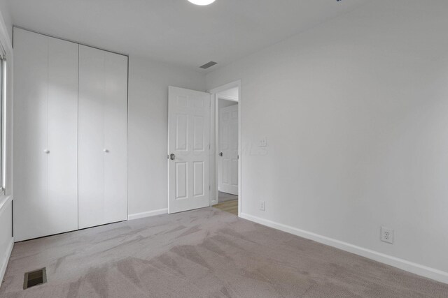 366 Orchard Ln, Sunbury, OH 43074 - unfurnished bedroom featuring carpet, a closet, and baseboards