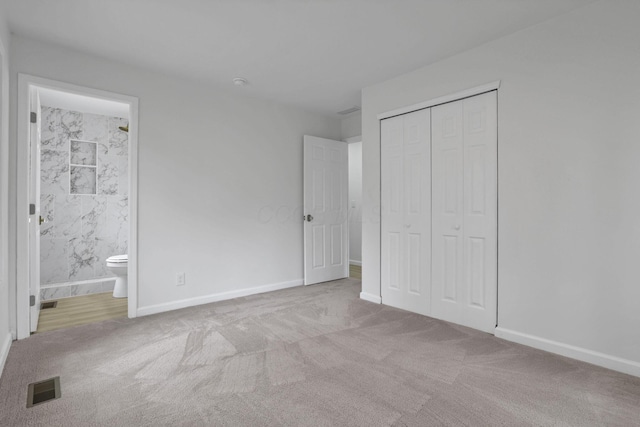 366 Orchard Ln, Sunbury, OH 43074 - unfurnished bedroom featuring carpet, a closet, baseboards, and ensuite bath