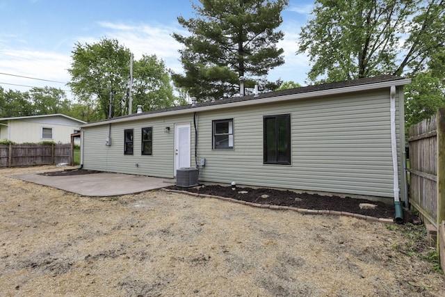 366 Orchard Ln, Sunbury, OH 43074 - rear view of house with a patio area and central AC unit