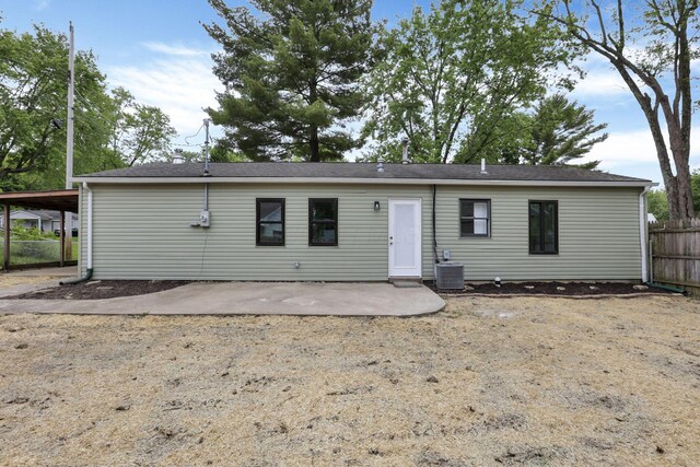 366 Orchard Ln, Sunbury, OH 43074 - rear view of house with central AC unit and a patio