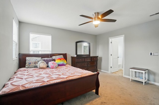 218 Christian St, Delaware, OH 43015 - bedroom with baseboards, light colored carpet, and ceiling fan