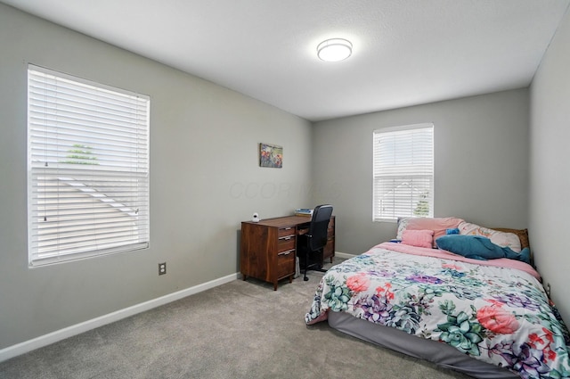 218 Christian St, Delaware, OH 43015 - bedroom featuring light colored carpet and baseboards