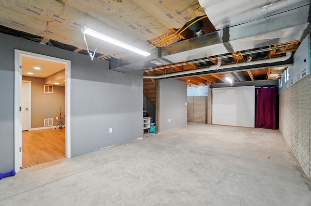 218 Christian St, Delaware, OH 43015 - unfinished below grade area featuring brick wall