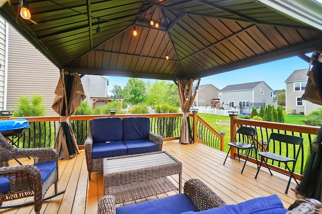 218 Christian St, Delaware, OH 43015 - deck with a gazebo, an outdoor hangout area, a yard, and a residential view