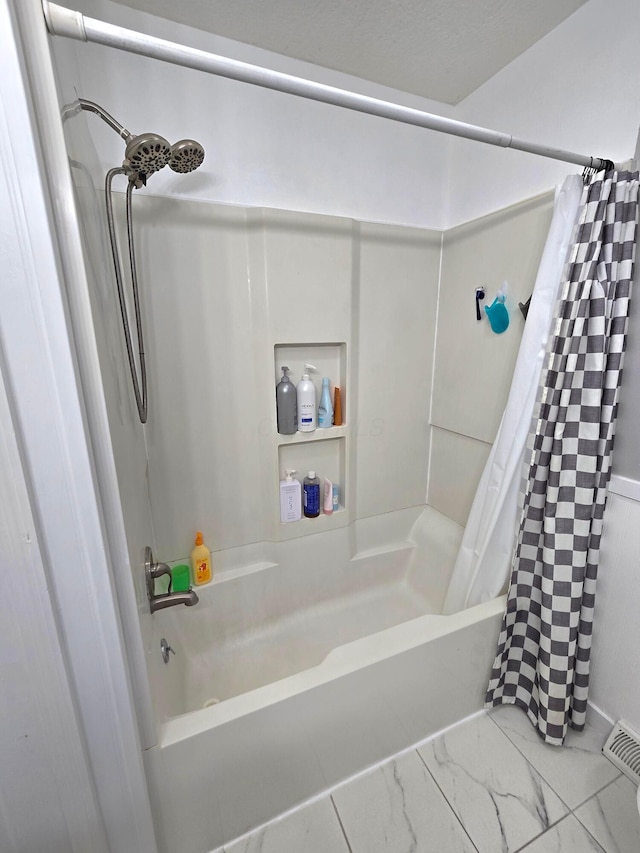 3523 Meldrake St, Columbus, OH 43230 - bathroom featuring shower / tub combo with curtain and marble finish flooring