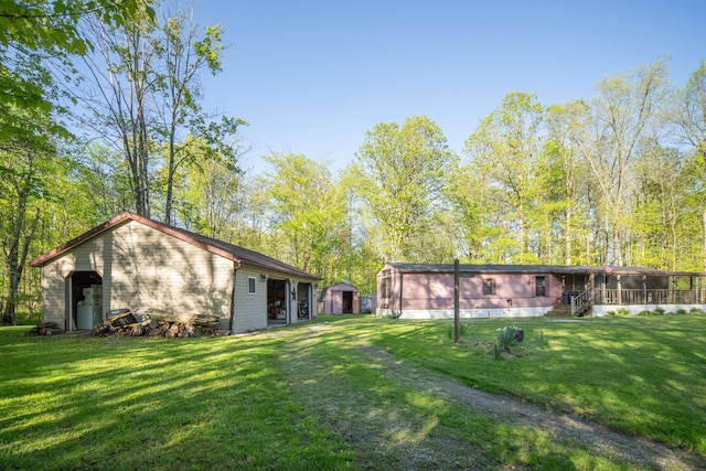 7326 State Route 19 Unit 5, Lot 105-107, Mount Gilead, OH 43338 - rear view of house with a sunroom and a yard