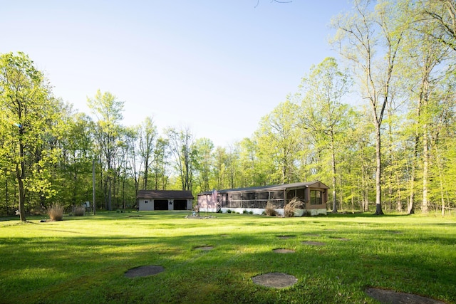 7326 State Route 19 Unit 5, Lot 105-107, Mount Gilead, OH 43338 - view of green lawn featuring a sunroom