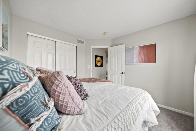 1779 Westwood Dr, Lewis Center, OH 43035 - bedroom with carpet flooring, a closet, and baseboards