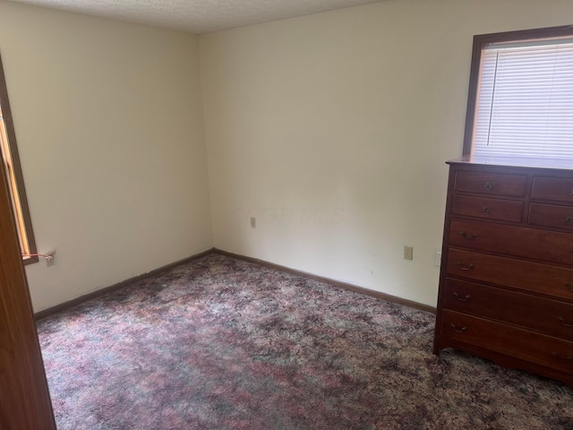 1539 Fuller Ct, Lancaster, OH 43130 - unfurnished bedroom featuring carpet floors and baseboards