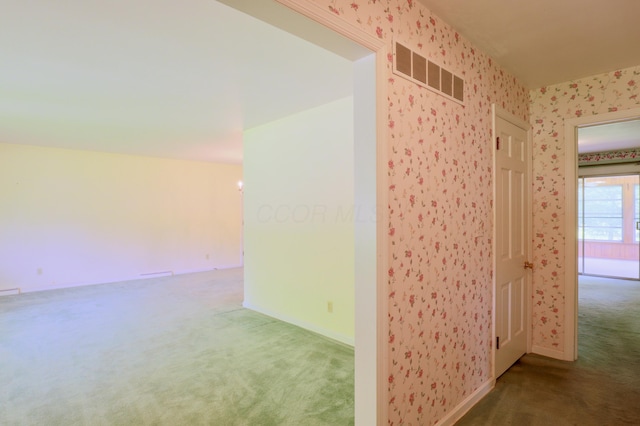 1602 Pleasantview Dr, Lancaster, OH 43130 - carpeted spare room featuring wallpapered walls and baseboards
