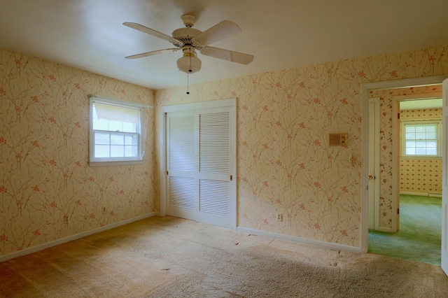 1602 Pleasantview Dr, Lancaster, OH 43130 - unfurnished bedroom with multiple windows, carpet, and a closet