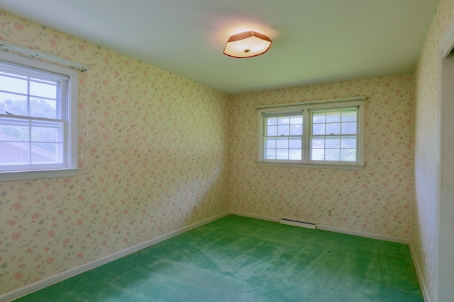 1602 Pleasantview Dr, Lancaster, OH 43130 - carpeted empty room with a baseboard radiator