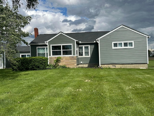 4902 Columbus Sandusky Rd N, Marion, OH 43302 - view of front facade featuring a front lawn, roof with shingles, and a chimney