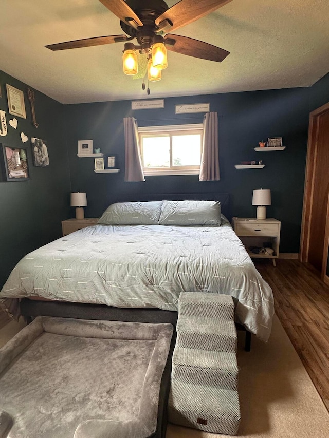 4902 Columbus Sandusky Rd N, Marion, OH 43302 - bedroom with wood finished floors, a ceiling fan, and baseboards