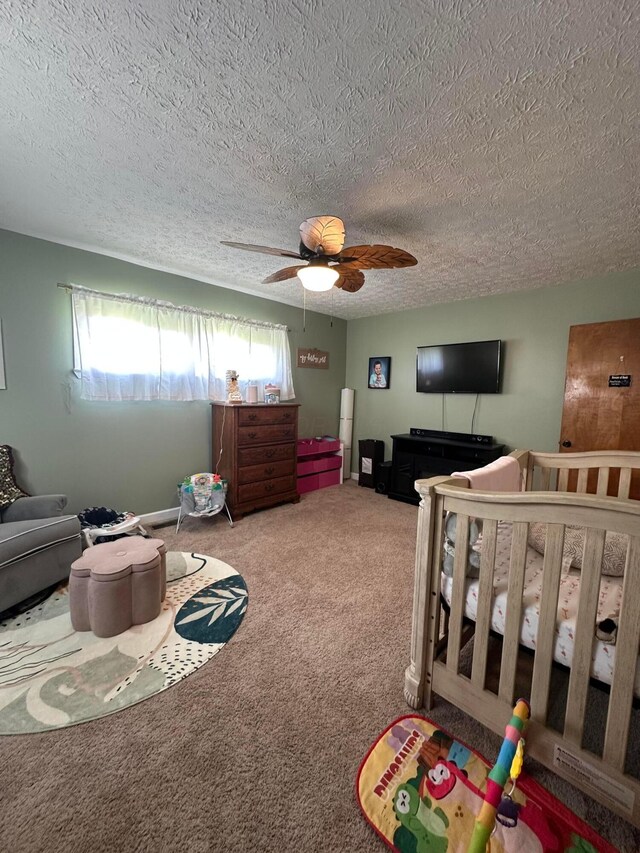 4902 Columbus Sandusky Rd N, Marion, OH 43302 - carpeted bedroom featuring a textured ceiling and a ceiling fan
