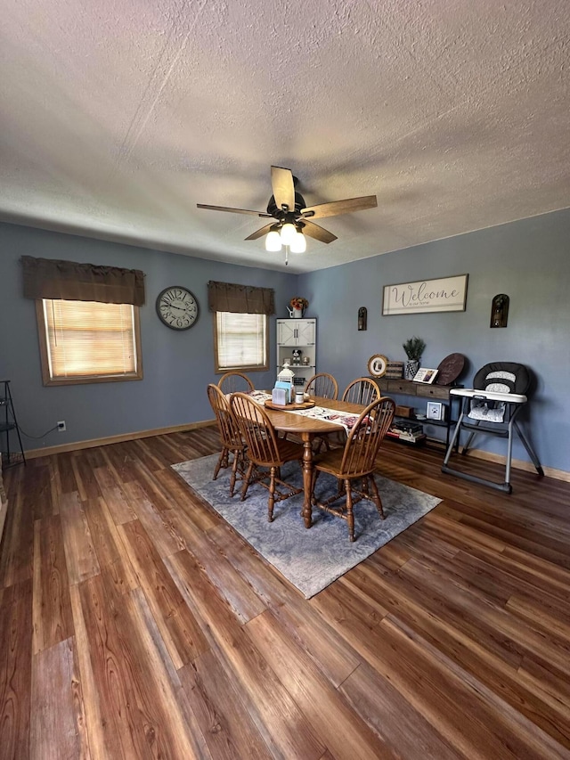 4902 Columbus Sandusky Rd N, Marion, OH 43302 - dining space featuring a textured ceiling, a ceiling fan, wood finished floors, and baseboards