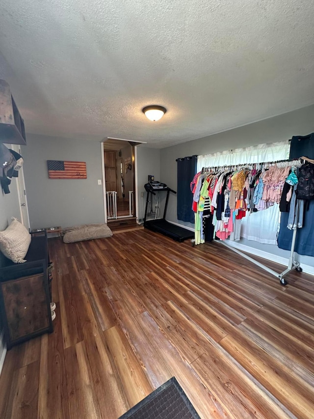 4902 Columbus Sandusky Rd N, Marion, OH 43302 - workout area featuring a textured ceiling and wood finished floors