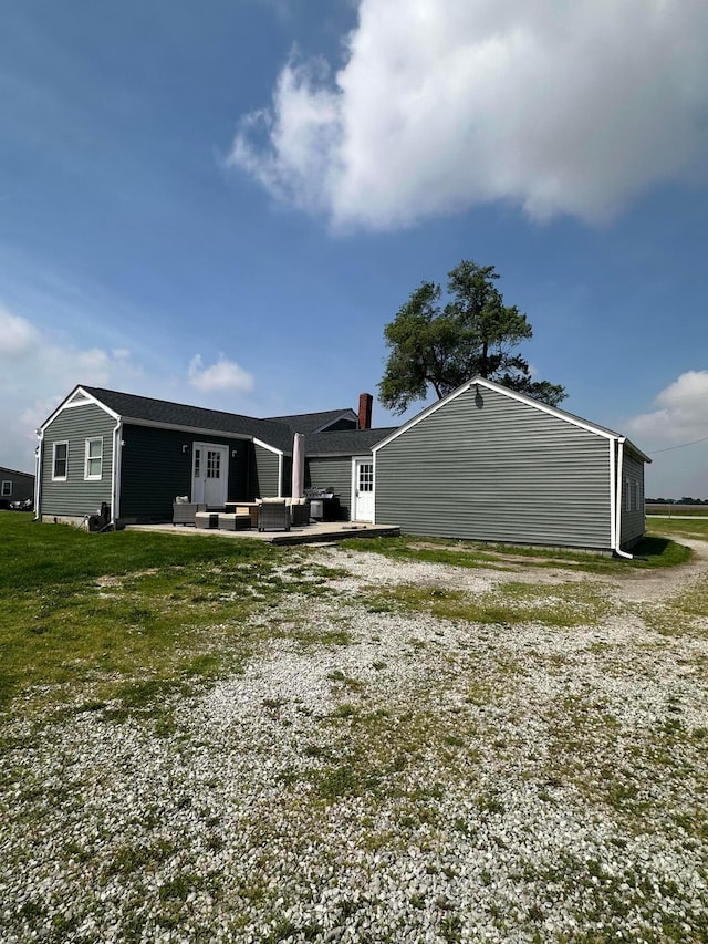 4902 Columbus Sandusky Rd N, Marion, OH 43302 - back of house featuring a chimney and driveway