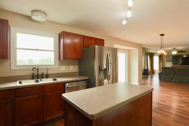 1690 Autumn Dr, Lancaster, OH 43130 - kitchen with a sink, appliances with stainless steel finishes, open floor plan, and dark wood-style floors