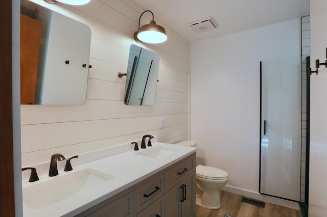1690 Autumn Dr, Lancaster, OH 43130 - full bath with wood finished floors, double vanity, toilet, and wood walls