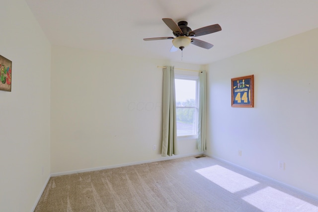 1690 Autumn Dr, Lancaster, OH 43130 - empty room featuring light colored carpet, ceiling fan, and baseboards
