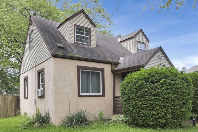 4209 Avery Rd, Hilliard, OH 43026 - view of property exterior featuring stucco siding and cooling unit