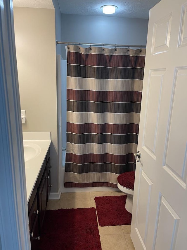 1279 Forsyth Ln, Galena, OH 43021 - bathroom with tile patterned floors, toilet, vanity, and a shower with shower curtain