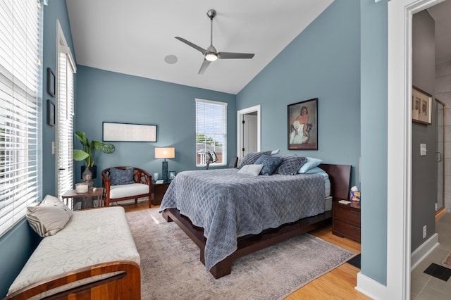 233 S Ohio Ave Unit 11, Columbus, OH 43205 - bedroom with wood finished floors, high vaulted ceiling, and a ceiling fan