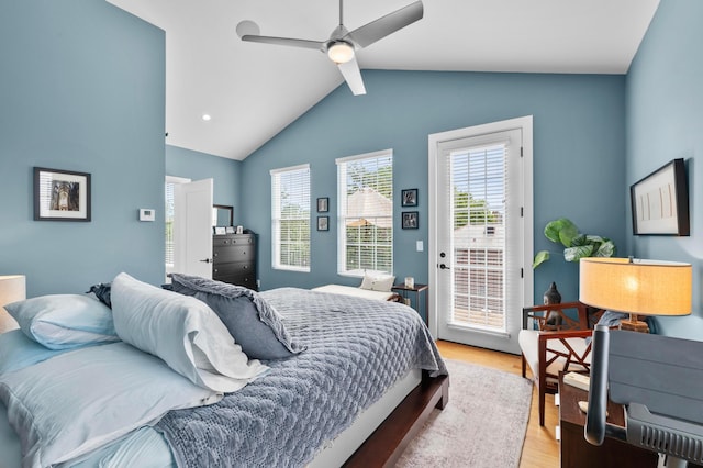 233 S Ohio Ave Unit 11, Columbus, OH 43205 - bedroom with access to outside, lofted ceiling, light wood finished floors, and a ceiling fan