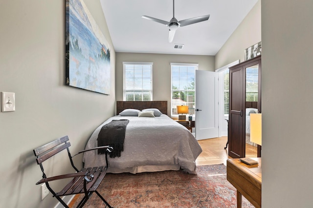233 S Ohio Ave Unit 11, Columbus, OH 43205 - bedroom with wood finished floors, ceiling fan, and access to outside