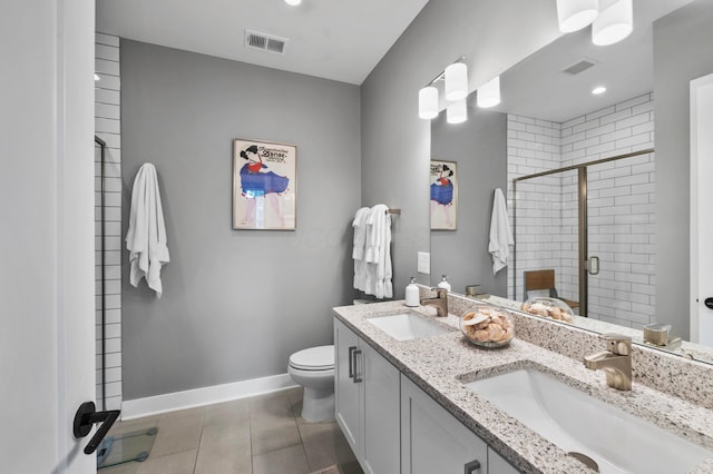 233 S Ohio Ave Unit 11, Columbus, OH 43205 - full bath with double vanity, a shower stall, toilet, tile patterned floors, and baseboards